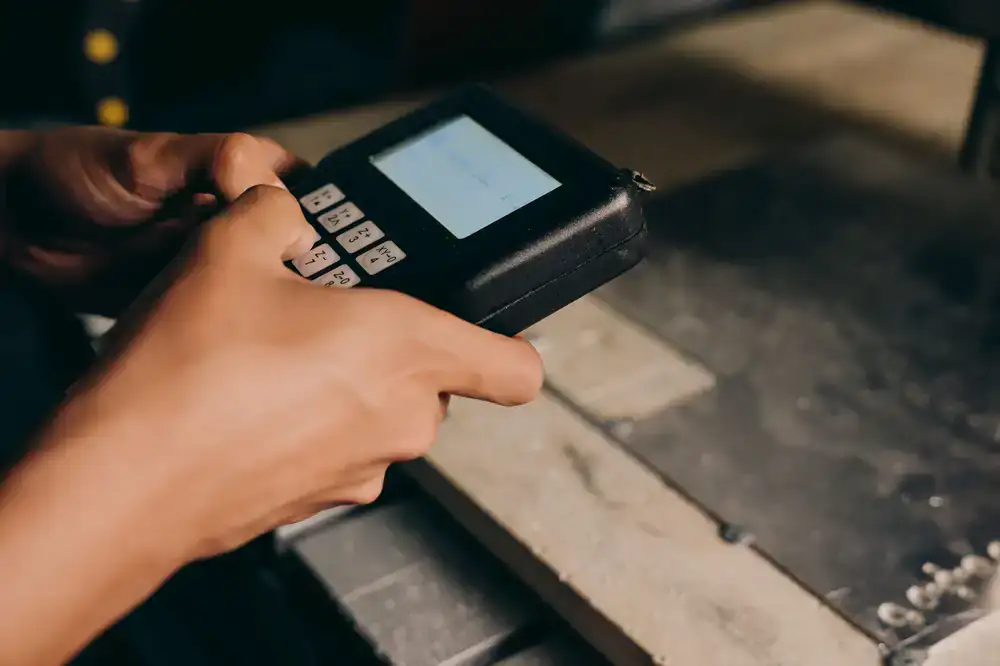 Hands on a controller executing fast inputs
